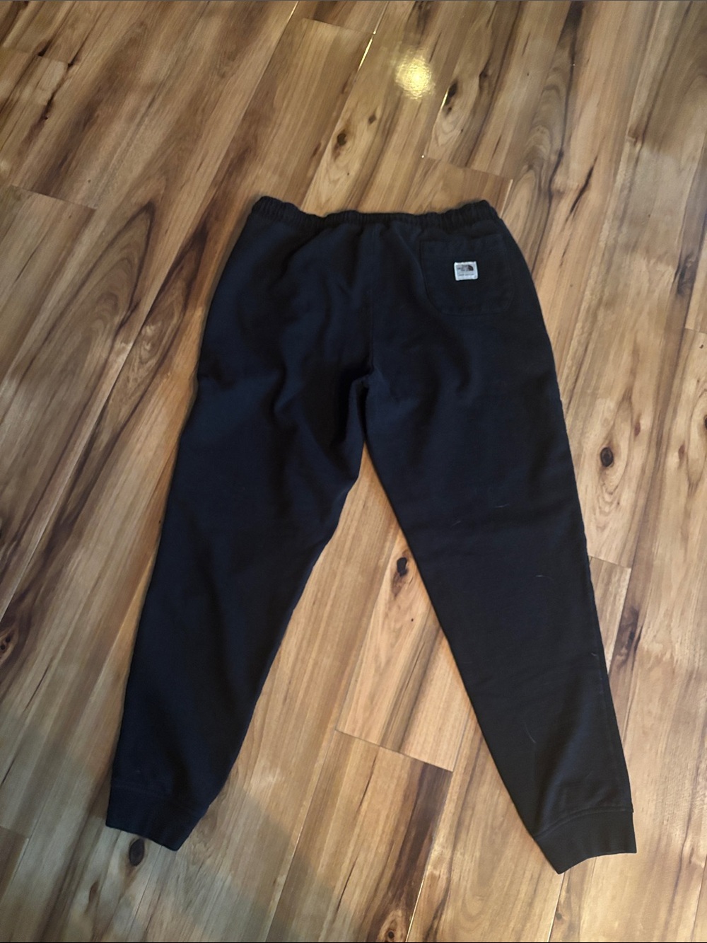 The North Face women’s
Black Joggers with Back Patch